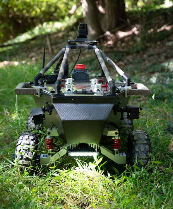 Raptor Defense Company VIPER unmanned ground vehicle in forest terrain
